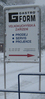 instalace reklamy před budovou - zima r. 2008